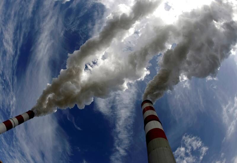 Smoke billows from the chimneys of Belchatow Power Station, Europe's biggest coal-fired power plant. Global CO2 emissions are set to climb to record levels in 2023 and continue rising in the following years. Reuters