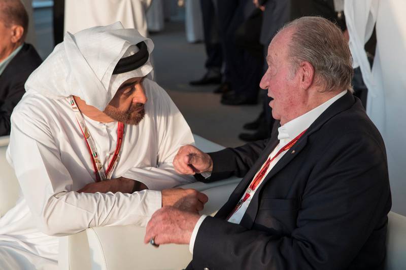 YAS ISLAND, ABU DHABI, UNITED ARAB EMIRATES - November 27, 2016: HH Sheikh Mohamed bin Zayed Al Nahyan Crown Prince of Abu Dhabi Deputy Supreme Commander of the UAE Armed Forces (L), speaks with HM Juan Carlos I former King of Spain (R), in Shams Tower on the final day of the 2016 Formula 1 Etihad Airways Abu Dhabi Grand Prix.( Ryan Carter / Crown Prince Court - Abu Dhabi )--- *** Local Caption ***  on28no-mbz-f1-06.jpg