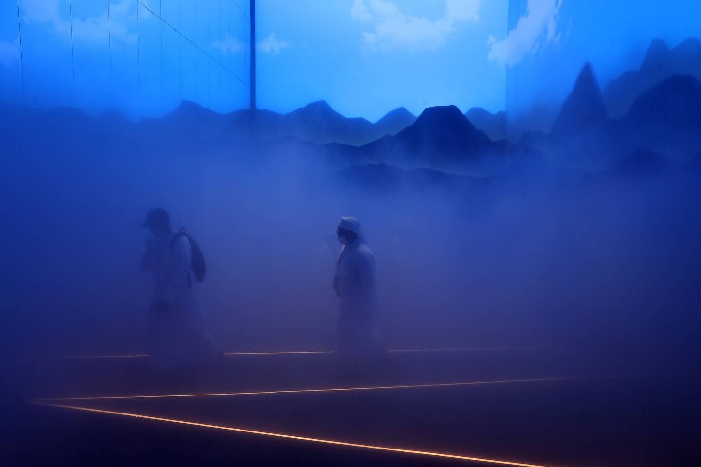 Visitors enjoying the fog inside the Switzerland Pavilion. Pawan Singh / The National