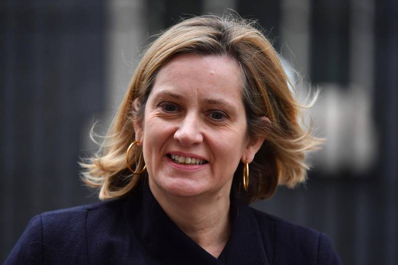 (FILES) In this file photo taken on November 26, 2018 Britain's Work and Pensions Secretary Amber Rudd leaves 10 Downing Street in London on November 26, 2018 after attending the weekly meeting of the cabinet.  senior government minister called on December 15, 2018 for British MPs from all parties to "forge a consensus" on Brexit to avoid a potentially damaging "no deal" withdrawal from the EU in March. / AFP / Ben STANSALL
