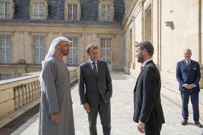 Sheikh Mohamed is received by President Macron at the palace.