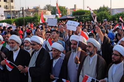 Iraqi Shiite clerics take part in anti-government demonstrations in Karbala city. AFP