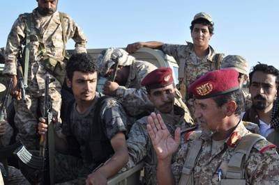Yemeni General Abd al-Rab Qassim al-Shadadi speaks to his troops at a UAE military base near Saffer, Yemen on Monday. As fighting rages on in Yemen, troops from the UAE that are part of a Saudi-led coalition battling Shiite rebels are pushing toward the country’s rebel-held capital, Sanaa. Adam Schreck / AP