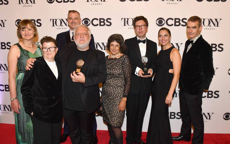 Actor Simon Russell Beale, fourth left, and playwright Ben Power, third right, winners of Best Performance by an Actor in a Leading Role in a Play and Best Play for 'The Lehman Trilogy', at the Tony Awards in New York on Sunday. AFP
