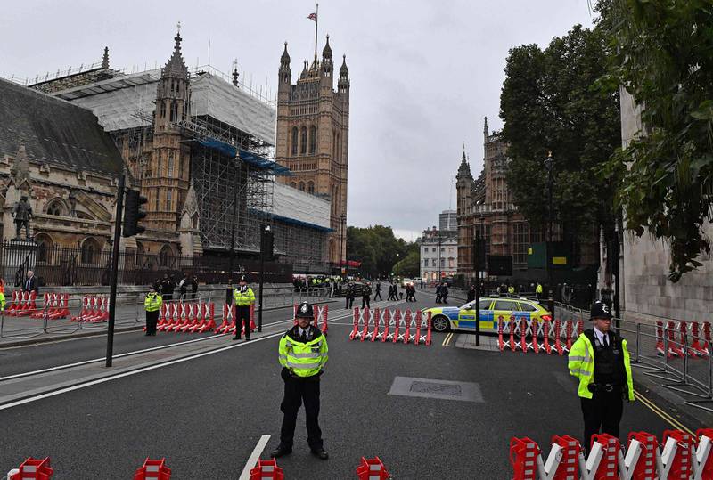 Police guard a cordon around the UK Parliament after Conservative MP David Amess was killed by an Islamist terrorist in his constituency. AFP