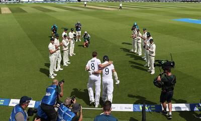 The Australian team form a guard of honour for England's Stuart Broad as he walks out to bat with James Anderson on the fourth day of the fifth Ashes Test. Getty 