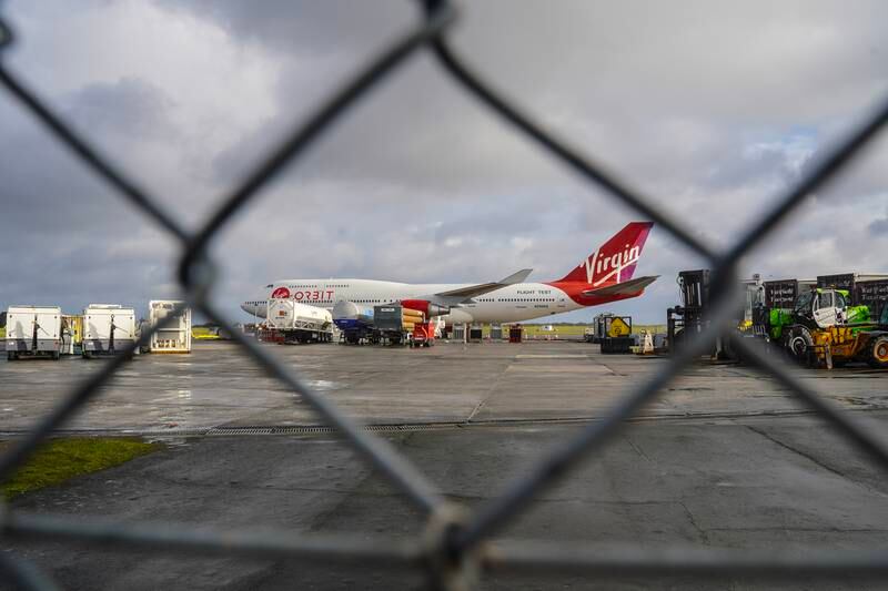 Cosmic Girl sits on the apron runway surrounded by technical service equipment at Cornwall Airport on January 8. Getty 