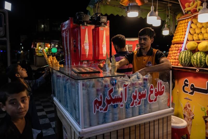 Evenings in Kabul have seen children joined by fighters buying fruit juice and ice cream.