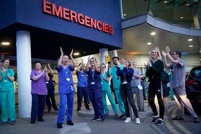 NHS staff applaud at the entrance of the Royal Liverpool Hospital as part of the "Clap For Our Carers" campaign in April 2020. Getty Images