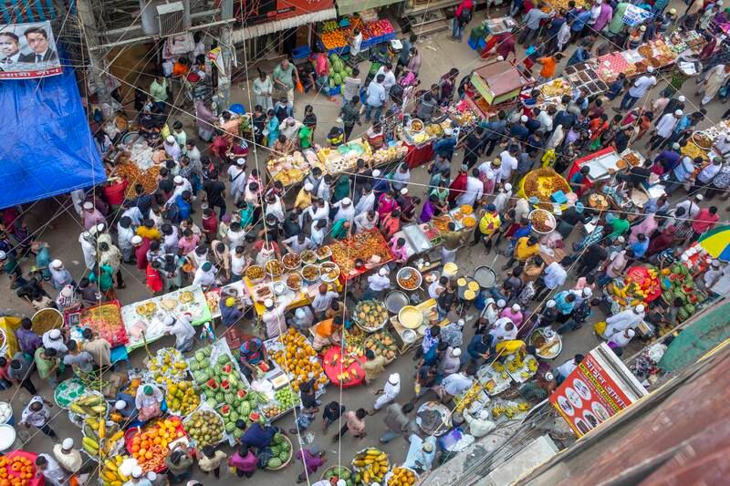 Bangladeshi Muslims buy food for breaking their fast during Ramadan at a traditional food market at Chalk bazaar in Dhaka. EPA