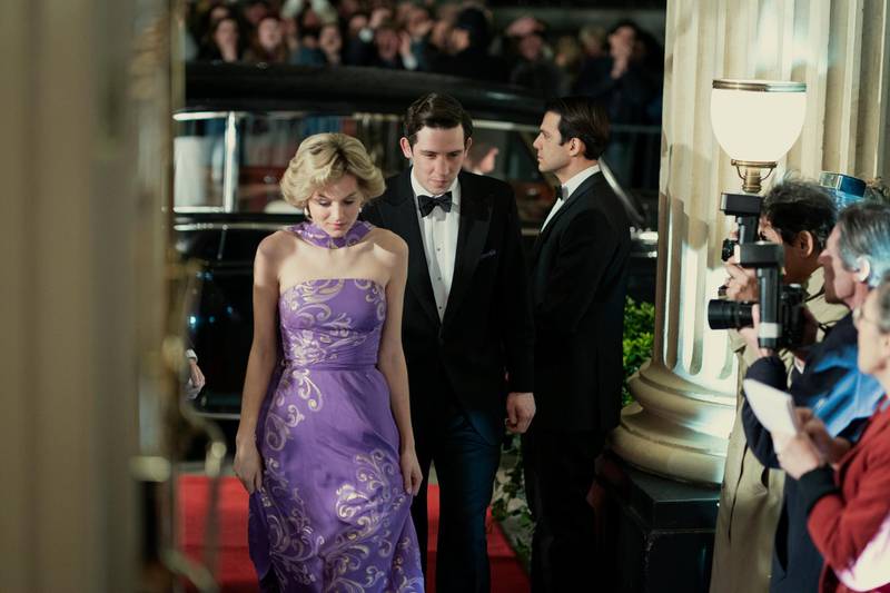 This image released by Netflix shows Emma Corrin, left, and Josh O'Connor in a scene from "The Crown." Season four premieres on Sunday, Nov. 15. (Ollie Upton/Netflix via AP)