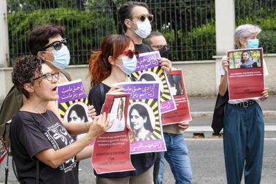 Protesters stage a demonstration near the Iranian embassy on the occasion of the one-year anniversary of the death of 22-year-old Mahsa Amini, in Rome. AP Photo