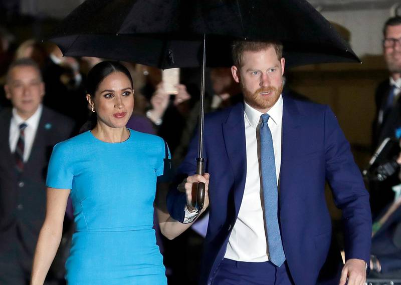 FILE - Prince Harry and Meghan, the Duke and Duchess of Sussex arrive at the annual Endeavour Fund Awards in London on March 5, 2020. The Duchess of Sussex has revealed that she had a miscarriage in July. Meghan described the experience in an opinion piece in the New York Times on Wednesday. She wrote: "I knew, as I clutched my firstborn child, that I was losing my second." The former Meghan Markle and husband Prince Harry have a son, Archie, born in 2019. (AP Photo/Kirsty Wigglesworth, File)