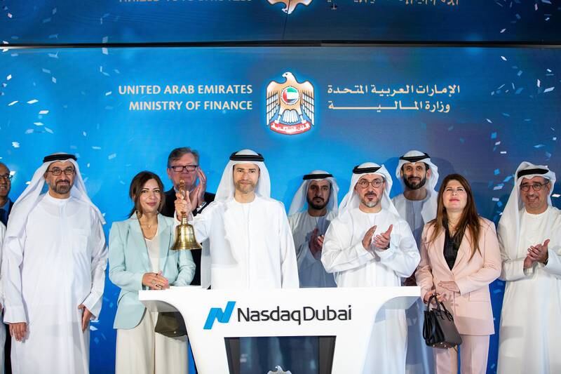 Mohamed Al Hussaini, Minister of State for Financial Affairs, rings Nasdaq Dubai’s market-opening bell to celebrate the listing of the UAE's Dh1.5 billion dirham-denominated T-bond. Photo: Ministry of Finance