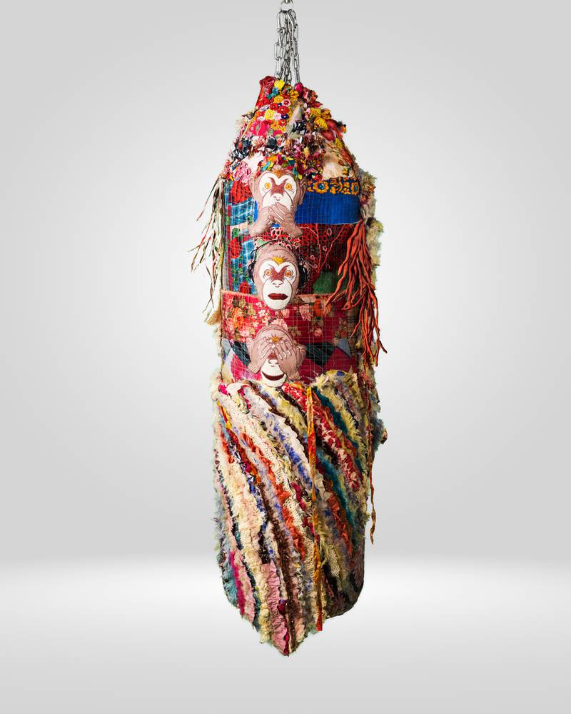 The embroidered punching bag features the three wise monkeys. Photo: Bokja