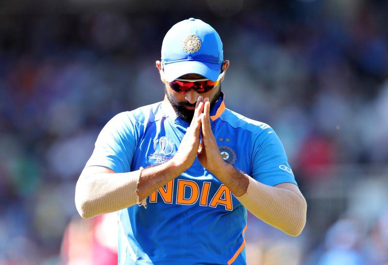 India's Mohammed Shami acknowledges the applause from the crowd after taking two wickets during the Cricket World Cup match between India and West Indies at Old Trafford in Manchester, England, Thursday, June 27, 2019. (AP Photo/Aijaz Rahi)