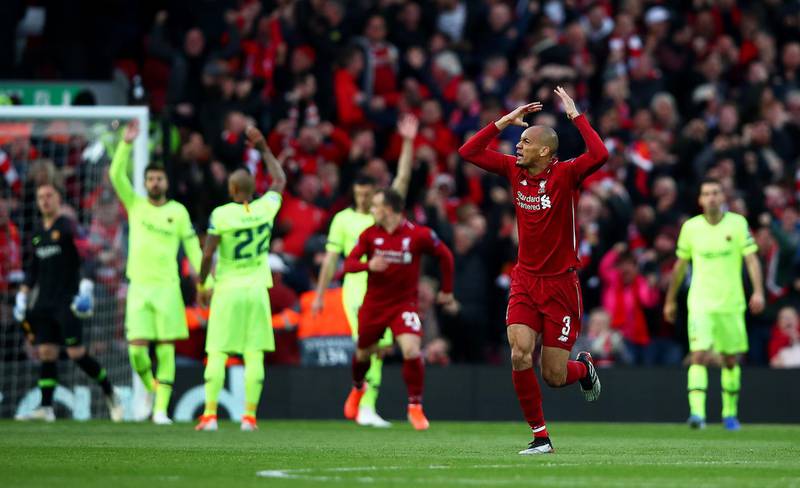 LIVERPOOL, ENGLAND - MAY 07:  Fabinho of Liverpool celebrates to the crowd after his team mate Divock Origi has scored the first goal during the UEFA Champions League Semi Final second leg match between Liverpool and Barcelona at Anfield on May 07, 2019 in Liverpool, England. (Photo by Clive Brunskill/Getty Images)