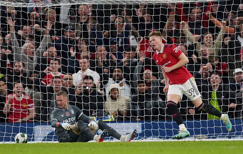 Manchester United's Scott McTominay, right, celebrates scoring their side's fourth goal during the Carabao Cup, third round match at Old Trafford, Manchester. PA