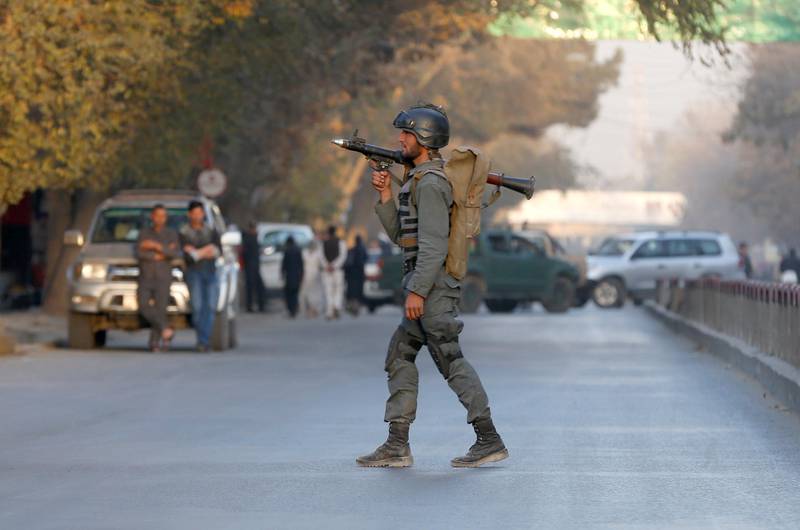An Afghan policeman keeps watch near the site of a blast in Kabul, Afghanistan.October 31, 2017. REUTERS/Omar Sobhani
