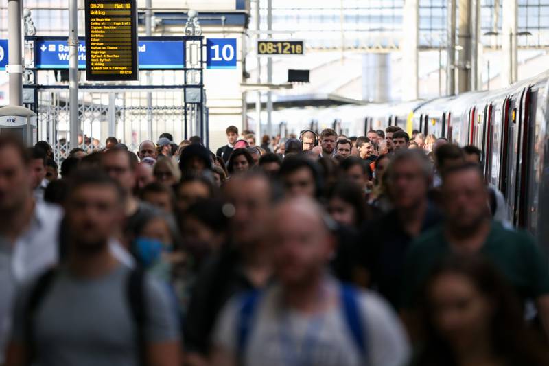 Passengers disembark at Waterloo station, after arriving on one of the few running passenger trains. Bloomberg