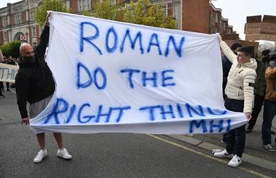 Protesting Chelsea fans give owner Roman Abramovich a message. EPA