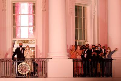 US President Joe Biden and First Lady Dr Jill Biden watch a firework display beside family and staff members from the Truman Balcony of the White House in Washington, DC. Reuters