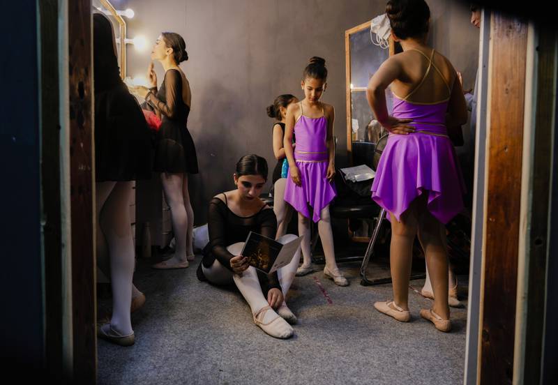 Students of the Ballet Academy prepare to perform during the school annual ceremony in Baghdad, Iraq, Friday, April 1, 2022.  (AP Photo / Hadi Mizban)