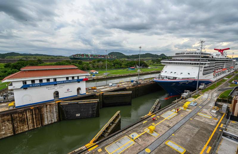 A ship navigates through the Miraflores locks, at the Panama Canal. The canal, which connects the Atlantic and Pacific oceans, has been struggling with water supply shortages due to lower rainfall. AFP