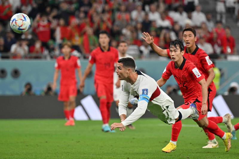 Portugal's Cristiano Ronaldo heads a chance wide. AFP
