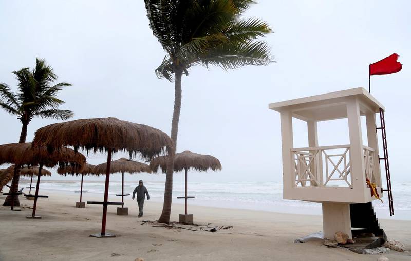 Strong waves smashed into empty tourist beaches. Many holidaymakers fled the storm on Thursday night before Salalah International Airport closed. Kamran Jebreili / AP Photo