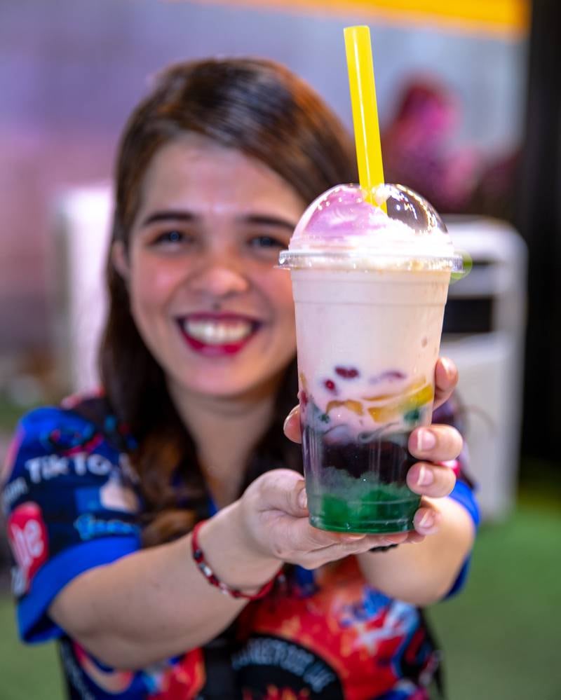 Kabayan Zone's halo-halo, which in English means mix mix. Halo-halo is shaved ice, with jellies, flan, macapuno, palm seeds, sweetened red beans, ube ice cream, fresh fruit, toasted coconut flakes, pinipig mixed with sweetened condensed milk or evaporated milk. Everyone makes it differently, and this is Kabayan Zone's version.