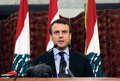 FILE - In this Tuesday, Jan. 24, 2017 file photo, French presidential candidate and former French Economy Minister Emmanuel Macron speaks during a press conference at the Government House, in downtown Beirut, Lebanon. French President Emmanuel Macron is traveling to Lebanon on Thursday Aug. 6, 2020, to offer support for the country after the massive, deadly explosion in Beirut. Lebanon is a former French protectorate and the countries retain close political and economic ties.  (AP Photo/Bilal Hussein, File)