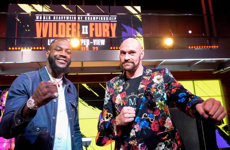 Deontay Wilder and Tyson Fury face-off during a press conference in Los Angeles. AFP