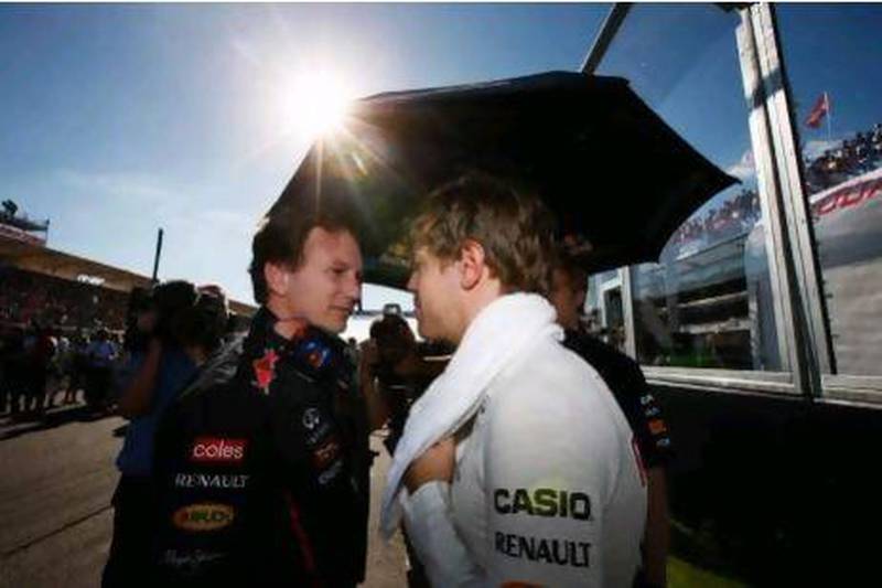 Christian Horner, the Red Bull team principal, left, with his team’s driver Sebastian Vettel.
