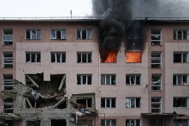 Smoke billows from a building on fire after a Russian attack in Bakhmut. AP