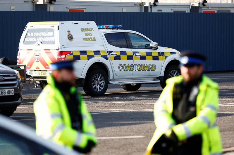 Police and coastguard officers gather at Dover. People are feared to have died after a small boat carrying migrants got into difficulty in the English Channel. Reuters