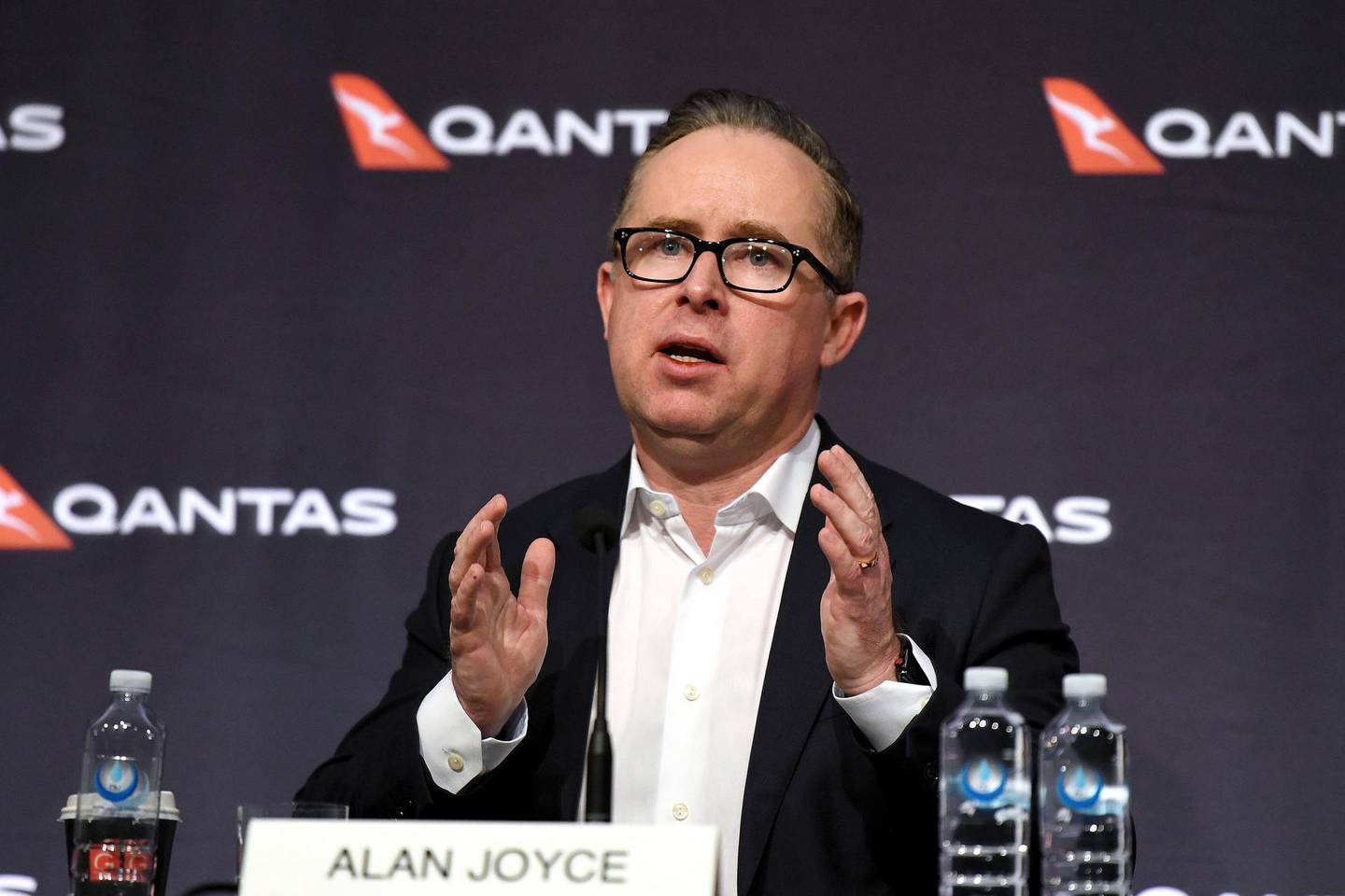 Qantas Chief Executive Alan Joyce speaks during a press conference in Sydney, Thursday, June 25, 2020. Qantas, Australia's largest airline, says it plans to cut at least 6,000 jobs and keep 15,000 more workers on extended furloughs as it tries to survive the coronavirus pandemic. Joyce announced a plan to reduce costs by billions of dollars and raise fresh capital. The plan includes grounding 100 planes for a year or more and immediately retiring its six remaining Boeing 747 planes. (Bianca De Marchi/AAP Image via AP)