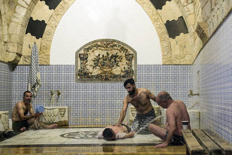 For centuries, men have come to the bathhouses of the northern Syrian city to wash, listen to music and even eat.