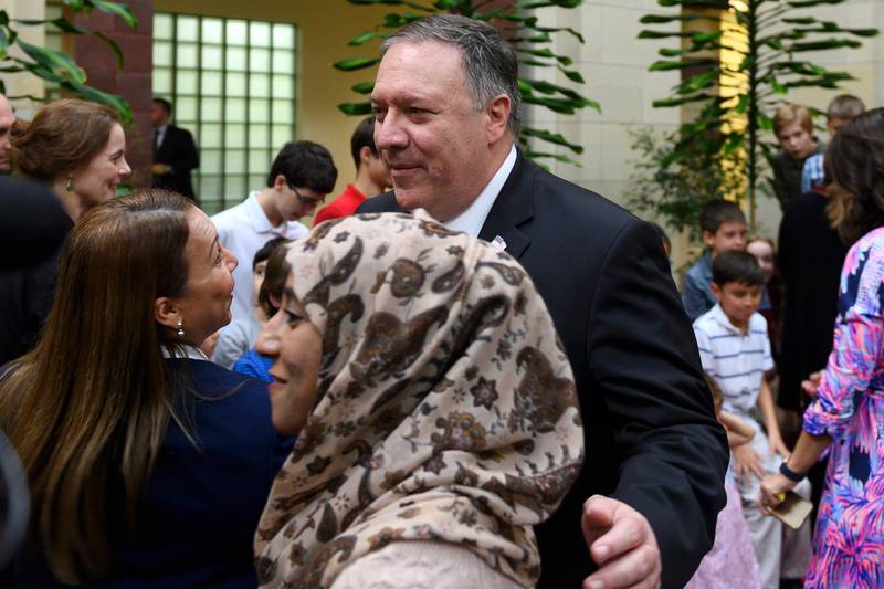 Secretary of State Mike Pompeo meets with staff and family members at the US Embassy in Muscat. AP Photo