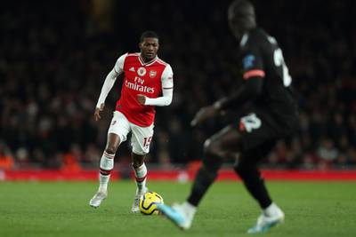 LONDON, ENGLAND - DECEMBER 15: Ainsley Maitland-Niles of Arsenal brings the ball forward during the Premier League match between Arsenal FC and Manchester City at Emirates Stadium on December 15, 2019 in London, United Kingdom. (Photo by James Williamson - AMA/Getty Images)