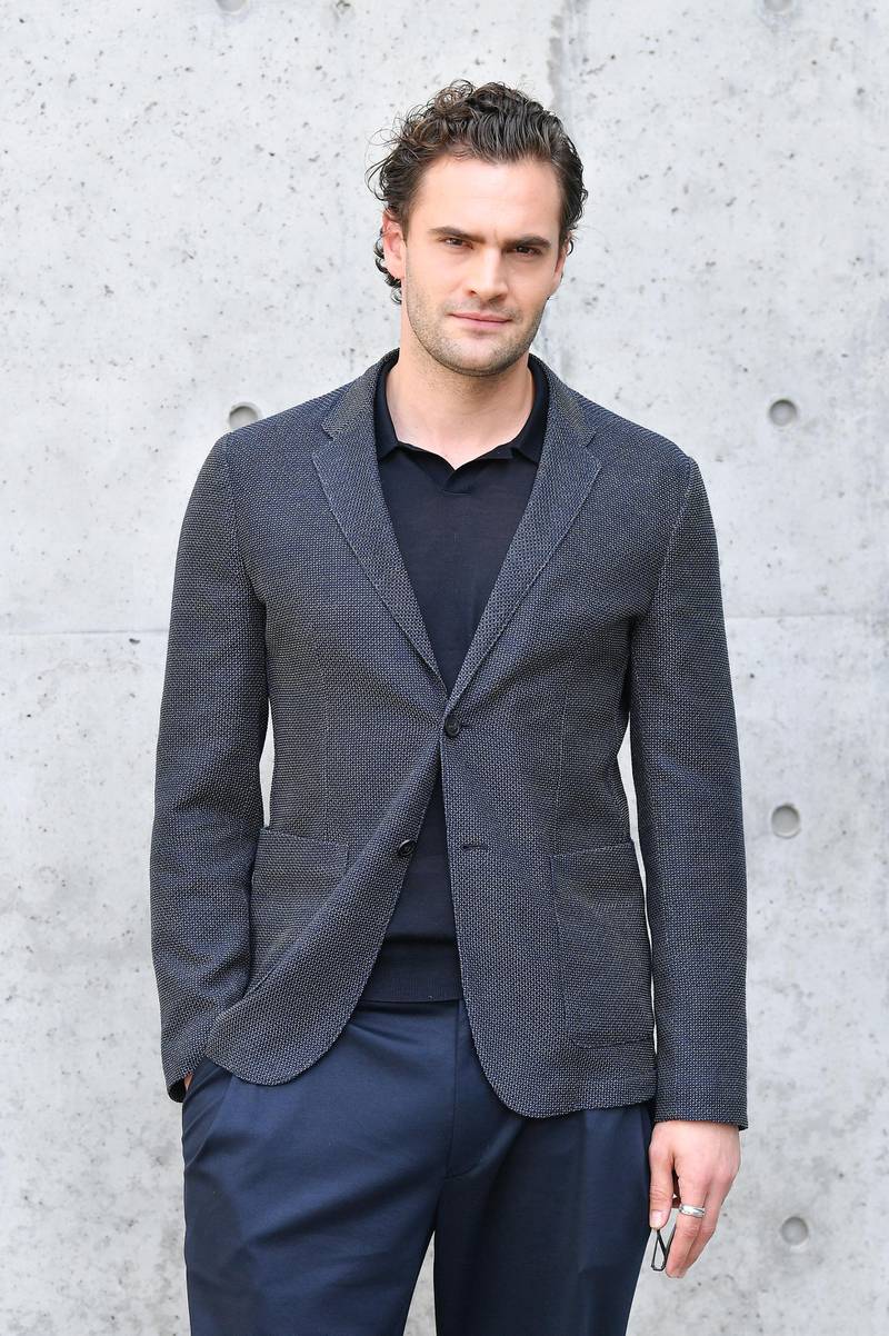 MILAN, ITALY - JUNE 15: Tom Bateman attends the Emporio Armani fashion show during the Milan Men's Fashion Week Spring/Summer 2020 on June 15, 2019 in Milan, Italy. (Photo by Jacopo Raule/Getty Images)
