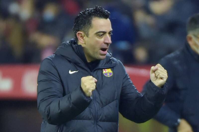 Barcelona coach Xavi celebrates their goal. AFP