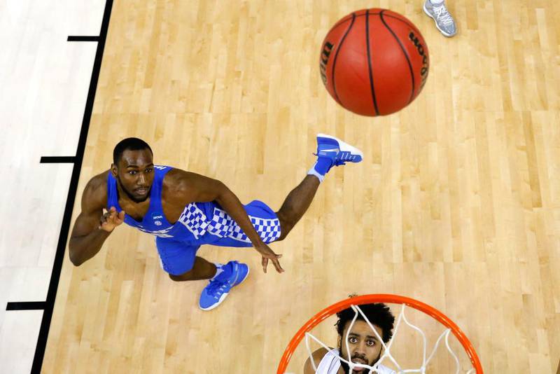 Dominique Hawkins of the Kentucky Wildcats shoots against Joel Berry of the North Carolina Tar Heels in an NCAA men’s basketball match in Memphis, Tennessee. Andy Lyons / Getty Images / AFP