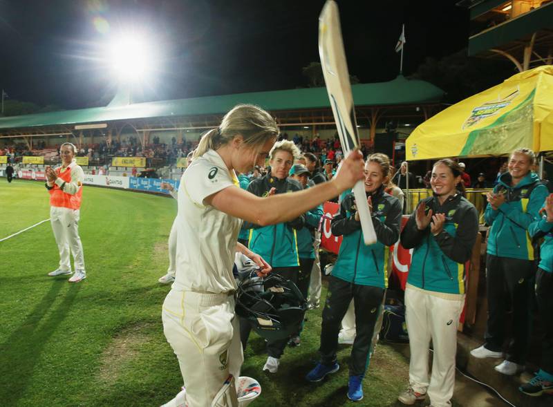 SYDNEY, AUSTRALIA - NOVEMBER 11:  Ellyse Perry of Australia salutes the crowd after making 213 runs before Australia declared during day three of the Women's Test match between Australia and England at North Sydney Oval on November 11, 2017 in Sydney, Australia.  (Photo by Mark Evans/Getty Images)