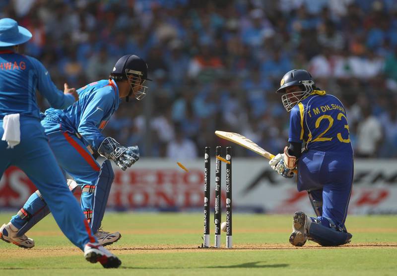 MUMBAI, INDIA - APRIL 02:  Tillakaratne Dilshan of Sri Lanka is bowled out during the 2011 ICC World Cup Final between India and Sri Lanka at the Wankhede Stadium on April 2, 2011 in Mumbai, India.  (Photo by Tom Shaw/Getty Images)