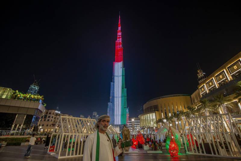 DUBAI, UNITED ARAB EMIRATES- Burj Khalifa lit up with UAE flag at Dubai Mall, Dubai.  Leslie Pableo for The National