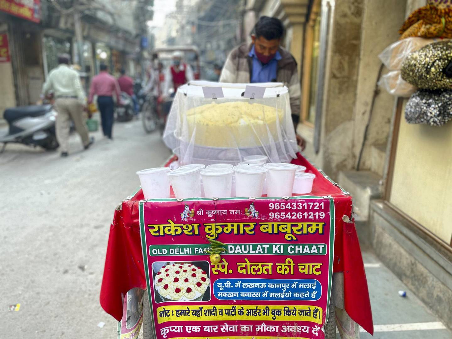 Rakesh Kumar Baburam sells daulat ki chaat from a colourful cart in Chandni Chowk, an area in Old Delhi. Photo: Rakesh Kumar