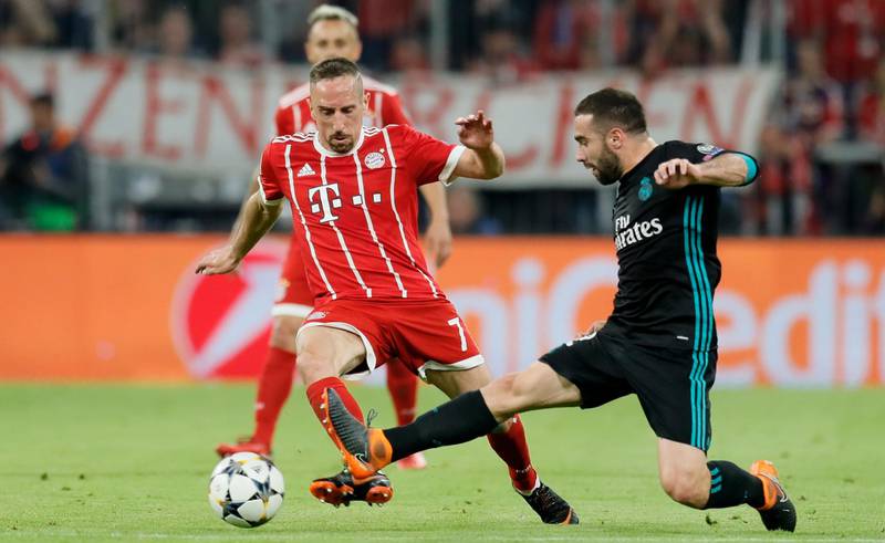 epa06692765 Bayern's Franck Ribery (L) and Real Madrid's Daniel Carvajal (R) in action during the UEFA Champions League semi final, first leg soccer match between Bayern Munich and Real Madrid at the Allianz Arena in Munich, Germany, 25 April 2018.  EPA/RONALD WITTEK