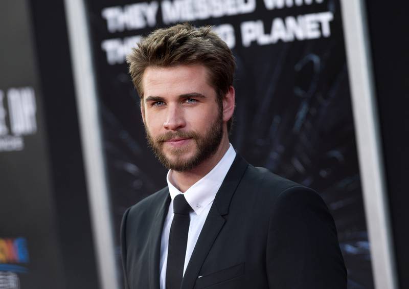 Liam Hemsworth said that fellow thespian Woody Harrelson inspired him to stop eating animal products. AFP