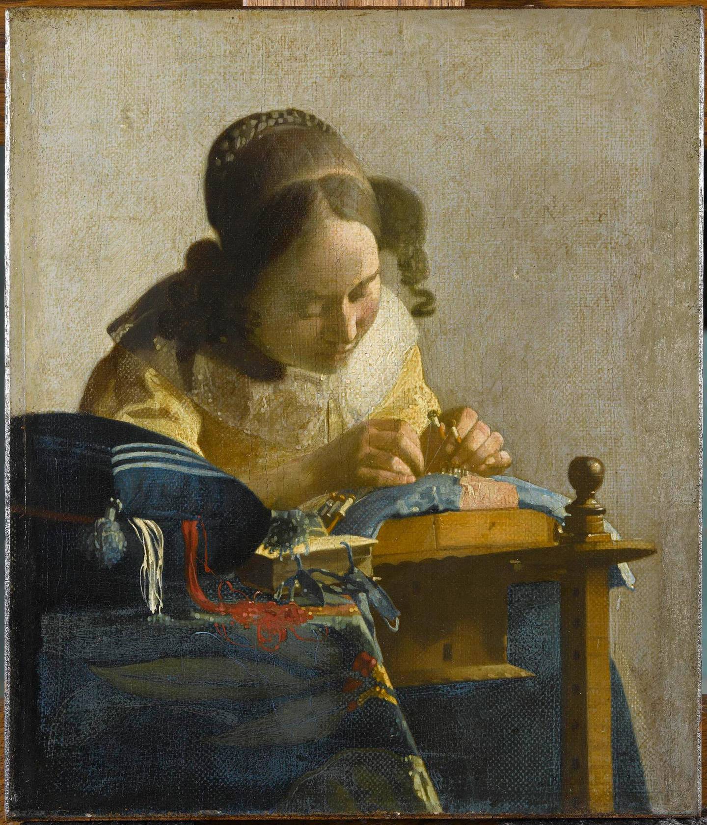 Johannes Vermeer (1632-1675), The Lacemakerca. 1669-70, Oil on canvas mounted on panel, Paris, Musée du Louvre©RMN-Grand Palais (musée du Louvre)/Gérard Blot